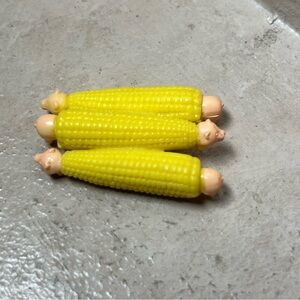 Barbie doll piggie holder corn on the cob